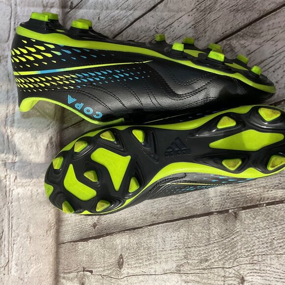 neon colored soccer cleats